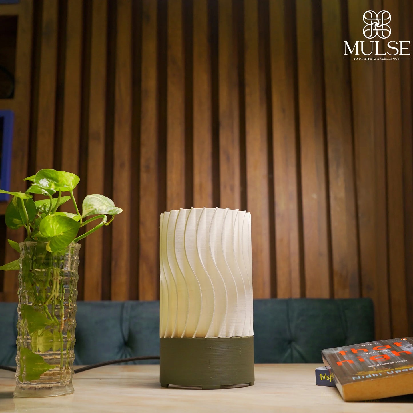Modern 3D printed table lamp with wavy design on wooden table, indoor home decor