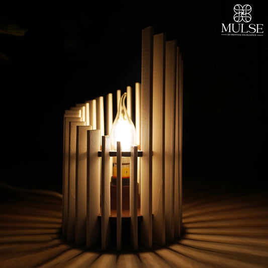Modern wooden table lamp with geometric slats casting warm light and shadows in a dark room